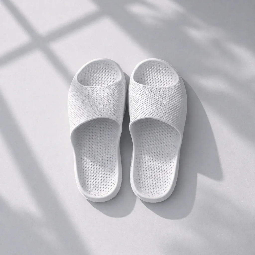 EASE 02 3D printed slide sandal — wave-textured upper and open honeycomb lattice sole