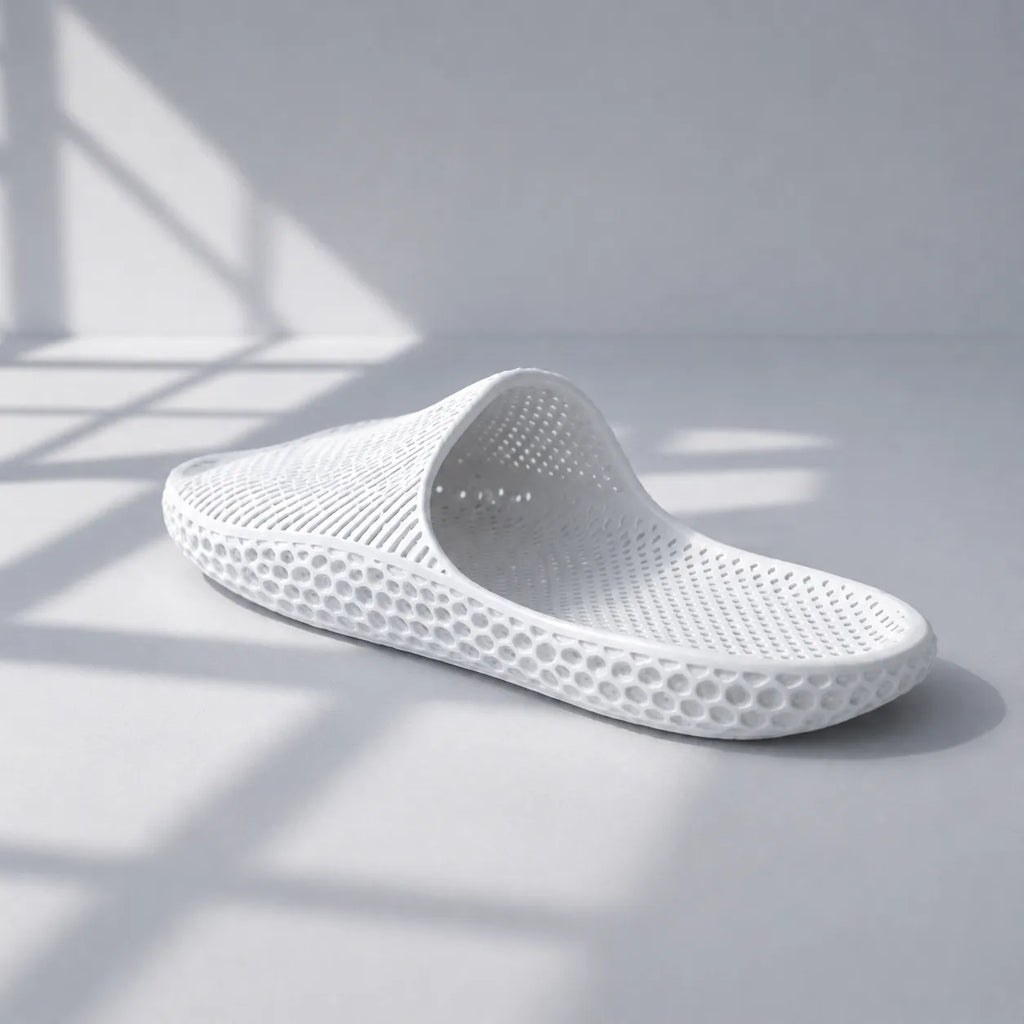 EASE 02 3D printed slide sandal — wave-textured upper and open honeycomb lattice sole