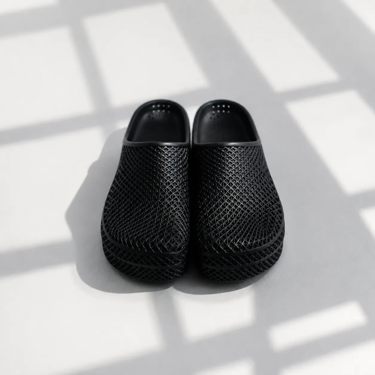 TRANSIT 01 3D printed mule — open lattice upper and platform sole