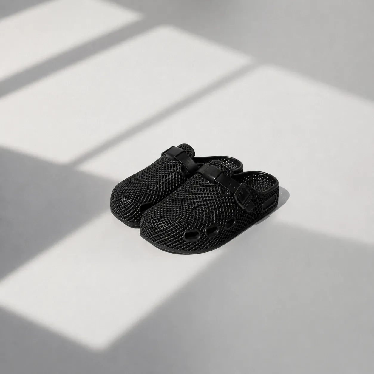 TRANSIT 02 3D printed clog — lattice upper, buckle strap, and contoured sole