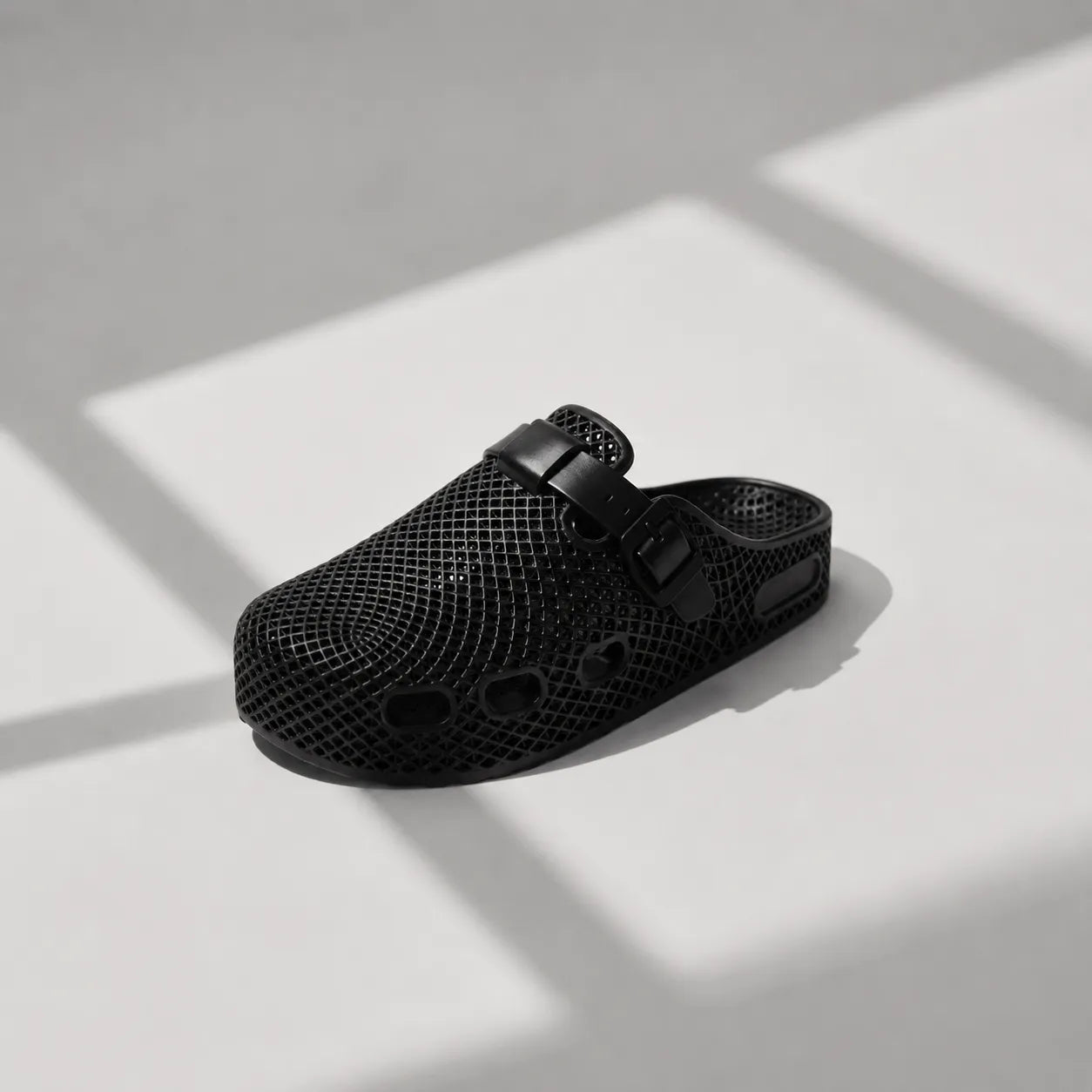 TRANSIT 02 3D printed clog — lattice upper, buckle strap, and contoured sole